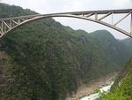 Jiangjiehe Bridge in 2008 before the Goupitan reservoir filled the valley below.jpg