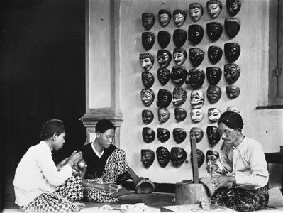 Javanese woodworkers making traditional masks during the Dutch East Indies era