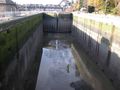 Lock emptied for maintenance – low water end of the lock.