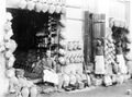 Men with pottery in front of two stores, T'bilisi, Georgia.jpg