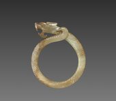 Fluted ring with a dragon head (huan); circa 475 BC; jade (nephrite); overall: 9.1 cm; Cleveland Museum of Art (Cleveland, USA)