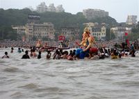 Immersion of Ganesha idol during the Ganesh Chaturthi festival in Maharashtra