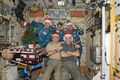 Crewmembers celebrating Christmas in Zvezda