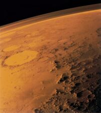 Mars appears to be red because of iron oxide on its surface.