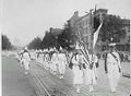 Members of the Ku Klux Klan (KKK), an American far-right white supremacist group, marching in a mass rally in Washington, D.C. in 1928.