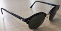 Ray-Ban 4246 Clubround sunglasses in colours of black and gold