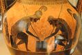 Achilles and Ajax playing a board game. Eight-pointed sun symbols are depicted on their cloaks. Amphora by Exekias, 6th century BC, Vatican Museum.