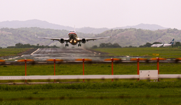Liberia, Costa Rica - Airplane taking off from international airport.png