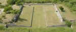 One of the ballcourts at Xochicalco. Note the characteristic -shape, as well as the rings set above the apron at center court. The setting sun of the equinox shines through the ring.[11]