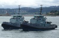 Canadian Glen class Naval Tugs in Esquimalt Harbour with Fisgard Lighthouse in background