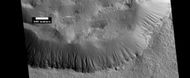 Gullies in a crater. Some seem to be young, others are well developed. Picture was taken by HiRISE under the HiWish program.