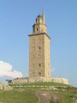 A stone tower with a square base topped by two octagonal sections.