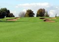 A sea of neatly cut grass surrounds the bunkers at Filton Golf Club, Bristol.