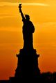 A silhouette of the Statue of Liberty in New York. Famous monuments are often identified by their silhouettes.