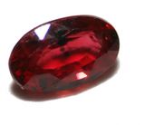 Natural ruby with inclusions