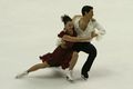 Ice dancers in lunge position