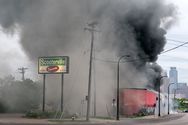 A fire burns at maX it PAWN in Minneapolis, Minnesota